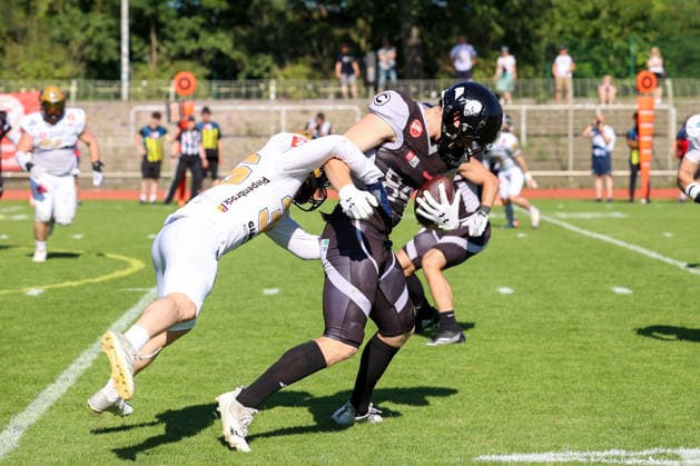 2026_08_08, Berlin Rebels vs Dresden Monarchs, GFL, Mommsenstadion, Berlin Justus Venker-metarp (Berlin Rebels, 84) mit dem Ball