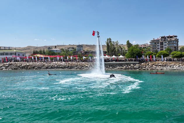 12th Van Sea Water Sports Festival kicks off on Lake Van VAN, TURKIYE - AUGUST 08: A view of participants and athletes taking part in the 12th Van Sea Water Sports Festival held at the Edremit-Gebze Water Sports Center on the shores of Lake Van in Van, Turkiye, on August 08, 2026. Organized to promote Lake Van and boost local tourism, the two-day event features Beach volleyball, Beachvolleyball and handball matches, flyboard demonstrations, canoeing, rowing, dragon boat races, and various recreational activities. Ozkan Bilgin Anadolu Van Turkey. Editorial use only. Please get in touch for any other usage. Copyright: x2026xAnadoluxOzkanxBilginx