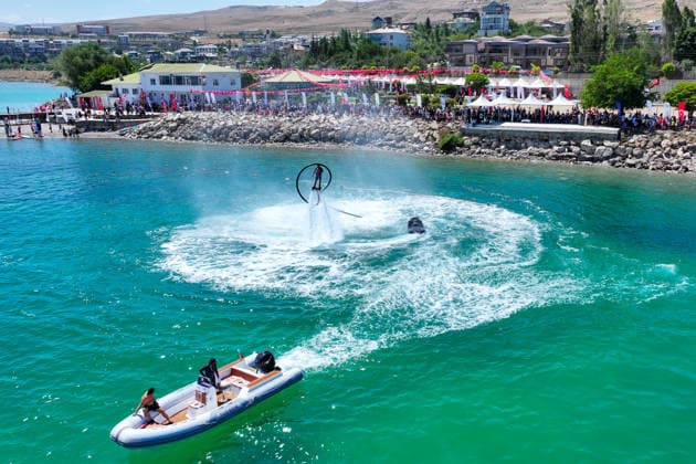 12th Van Sea Water Sports Festival kicks off on Lake Van VAN, TURKIYE - AUGUST 08: A view of participants and athletes taking part in the 12th Van Sea Water Sports Festival held at the Edremit-Gebze Water Sports Center on the shores of Lake Van in Van, Turkiye, on August 08, 2026. Organized to promote Lake Van and boost local tourism, the two-day event features Beach volleyball, Beachvolleyball and handball matches, flyboard demonstrations, canoeing, rowing, dragon boat races, and various recreational activities. Ozkan Bilgin Anadolu Van Turkey. Editorial use only. Please get in touch for any other usage. Copyright: x2026xAnadoluxOzkanxBilginx