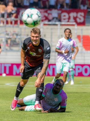 Ingolstadt, Deutschland 08. August 2026: 3. Liga - 2026 2027 - Sp. 1 - FC Ingolstadt 04 gegen FC Würzburger Kickers Im Bild: v. li. im Zweikampf Jonas Scholz (FCI) und Tarsis Bonga (FWK) DFB DFL regulations prohibit any use of photographs as image sequences and or quasi-video Audi Sportpark Bayern Copyright: xFotostandx xSchäferx