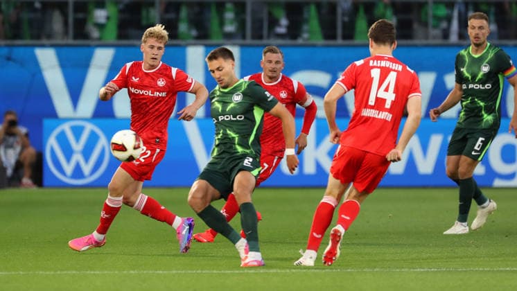 VfL vs. 1. FCK , 2. BL Wolfsburg, 08.08.2026, Fußball, Herren, 2. BL, Saison 2026 2027, VfL Wolfsburg vs. 1. FC Kaiserslautern: Mika Haas (1. FC Kaiserslautern), Kilian Fischer (VfL Wolfsburg) (DFL DFB REGULATIONS PROHIBIT ANY USE OF PHOTOGRAPHS as IMAGE SEQUENCES and or QUASI-VIDEO) Volkswagen Arena Niedersachsen Deutschland