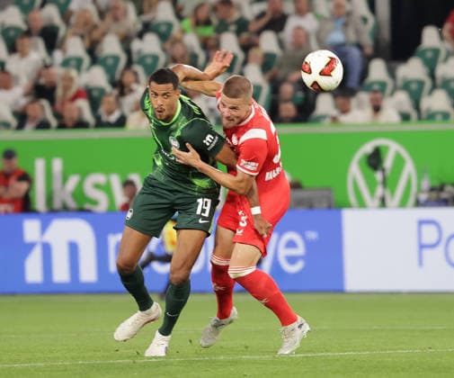 Robert Glatzel (VfL Wolfsburg), Jan Elvedi (1.FC Kaiserslautern) Fussball, Herren, Saison 2026 2027, 2.Liga, Volkswagenarena, VfL Wolfsburg gegen 1.FC Kaiserslautern 0-0 DFL REGULATIONS PROHIBIT ANY USE OF PHOTOGRAPHS AS IMAGE SEQUENCES AND OR QUASI-VIDEO.