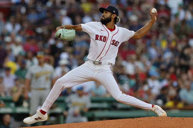 Boston Red Sox pitcher Raymond Burgos delivers a pitch during the seventh inning against the Athletics at Fenway Park in Boston, Massachusetts on Saturday, August 8, 2026.  BOP2026080815 CJxGUNTHER