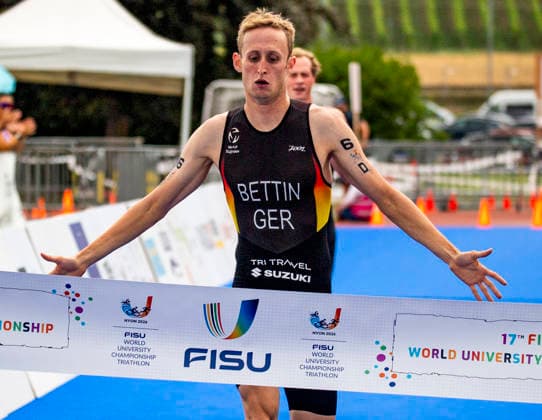 August 9, 2026, Nyon, Vaud, Switzerland: Nyon Switzerland, 08 09 2026: BETTIN BENEDIKT of Germany wins the race and takes the gold medal at the international university championship during FISU World University Championship Triathlon Nyon 2026 (International University Sports Federation). The NyonTriathlon is the final of the FISU World University Triathlon Championship which also the 37th edition and took place at Nyon in Vaud in Switzerland. Nyon Switzerland - ZUMAd206 20260809_zip_d206_001 Copyright: xEricxDubostx