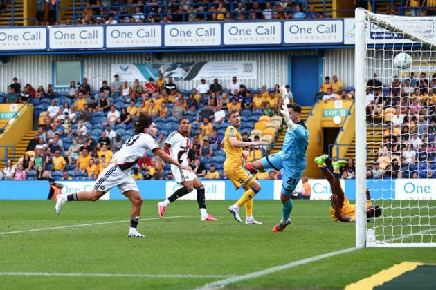 Mansfield, England, 9th August 2026. Callum O Hare of Sheffield United scores the third goal during the Mansfield Town vs Sheffield United Carabao Cup match at the One Call Stadium, Mansfield. Picture credit should read: Jake Youle Sportimage EDITORIAL USE ONLY. No use with unauthorised audio, video, data, fixture lists, club league logos or live services. Online in-match use limited to 120 images, no video emulation. No use in betting, games or single club league player publications. SPI_021_JY_Mansfield_Sheff_Utd SPI-4894-0026