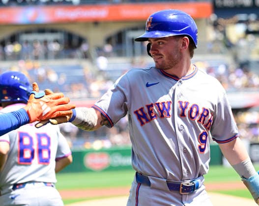 New York Mets center fielder A.J. Ewing (9) celebrates scoring in the first inning against the Pittsburgh Pirates at PNC Park on Sunday, August 9, 2026 in Pittsburgh.  PIT2026080907 ArchiexCarpenter