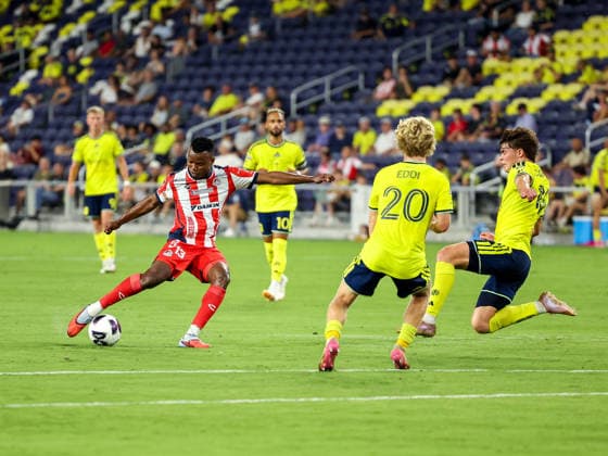 August 9, 2026: Atletico de San Luis midfielder Johan Caicedo (13) kicks the ball into a sliding Nashville SC midfielder Matthew Corcoran (16) during a Leagues Cup match between Atletico de San Luis and Nashville SC at Geodis Park in Nashville, TN. CSM Nashville United States of America - ZUMAc04_ 20260809_zma_c04_105 Copyright: xStephenxFurstx