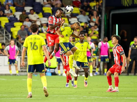August 9, 2026: Atletico de San Luis midfielder Johan Caicedo (13) heads the ball over the back of Nashville SC midfielder Hany Mukhtar (10) during a Leagues Cup match between Atletico de San Luis and Nashville SC at Geodis Park in Nashville, TN. CSM Nashville United States of America - ZUMAc04_ 20260809_zma_c04_111 Copyright: xStephenxFurstx