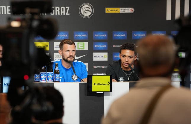 SOCCER - UEFA CL, Sturm vs Fenerbahce GRAZ,AUSTRIA,10.AUG.26 - SOCCER - UEFA Champions League, qualification, Sturm Graz vs Fenerbahce Istanbul, preview, press conference, PK, Pressekonferenz Sturm. Image shows head coach Fabio Ingolitsch and Jakob Peter Hoedl (Sturm).  GEPAxpictures xMichaelxRiedler