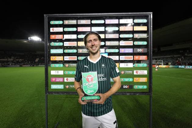 Alex Hartridge of Plymouth Argyle with the Carabao player of the match award at full time Plymouth Argyle v Exeter City, EFL Carabao Cup, First Round, Football, Home Park, Plymouth, UK - 10 Aug 2026Plymouth Home Park United Kingdom EDITORIAL USE ONLY No use with unauthorised audio, video, data, fixture lists, club league logos or live services. Online in-match use limited to 120 images, no video emulation. No use in betting, games or single club league player publications. Copyright: xKieranxMcManus Shutterstockx 17061087bo