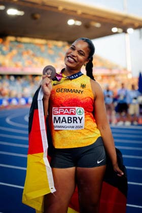 European Athletics Championships; Birmingham, 10.08.2026 Yemisi Mabry from Germany celebrates with her medal and flag at the 2026 European Athletics Championships in Birmingham. Copyright: xBEAUTIFULxSPORTS Flatemerschx