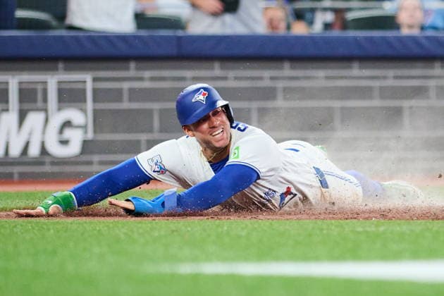 August 10, 2026, Toronto, On, Canada: Toronto Blue Jays George Springer (4) slides in to score on an RBI single by Andres Gimenez (0) during sixth inning MLB, Baseball Herren, USA baseball action against the Boston Red Sox in Toronto, on Monday, Aug. 10, 2026. Canada News - August 10, 2026 - ZUMAc35_ 20260810_zaf_c35_100 Copyright: xSammyxKoganx