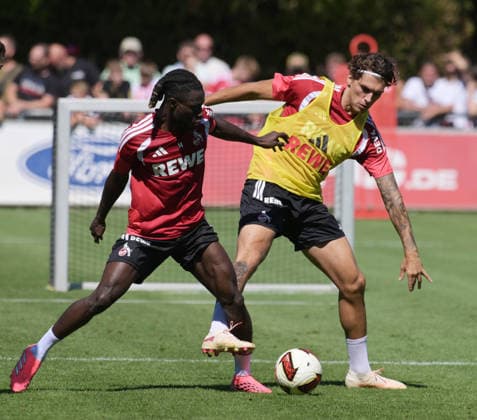 11.08.2026, xophax, Fussball 1.Bundesliga, 1.FC Koeln Training am Geissbockheim des 1.FC Köln. Platz 1. Gideon Mensah ( 1.FC Köln ) , links und Julian Pauli , rechts ( 1.FC Köln ) Köln
