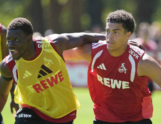 11.08.2026, xophax, Fussball 1.Bundesliga, 1.FC Koeln Training am Geissbockheim des 1.FC Köln. Platz 1. Ragnar Ache i , links ( 1.FC Köln ) und Jahmai Simpson-Pusey, rechts ( 1.FC Köln ) Köln