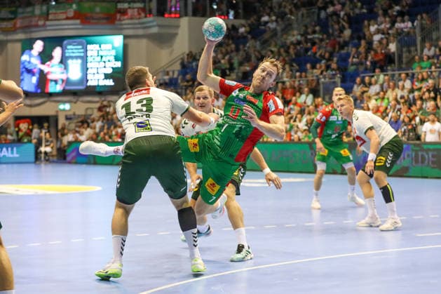 11.08.2026, xgox, Handball - Hummel Cup 2026 SC Magdeburg - GWD Mindenemspor, v.l. Felix Claar (Magdeburg, 7) wirft Tor, Torschuetze, erzielt Tor, Treffer, scores the goal Magdeburg
