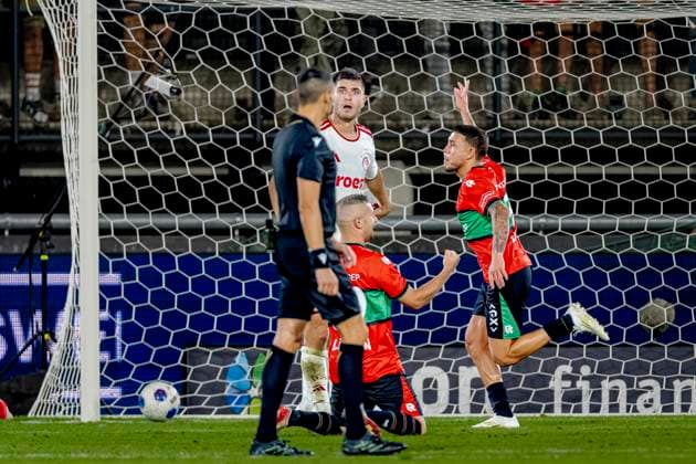 NIJMEGEN - N.E.C. Nijmegen aanvaller Emre Mor scoort de 2-1 en viert zijn doelpunt tijdens de Champions League wedstrijd tussen N.E.C. en Olympiacos in Stadion de Goffert op 11 augustus 2026 in Nijmegen , Nederland. -