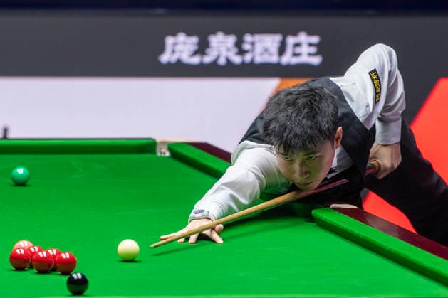 (260812) -- TAIYUAN, Aug. 12, 2026 -- Zhao Xintong of China competes during the round 1 match between Zhao Xintong of China and Zhang Anda of China at China Open 2026 snooker tournament in Taiyuan, north China s Shanxi Province, Aug. 11, 2026. ) (SP)CHINA-TAIYUAN-SNOOKER-CHINA OPEN-ROUND 1 (CN) CaoxYang