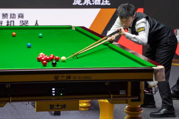 (260812) -- TAIYUAN, Aug. 12, 2026 -- Zhao Xintong of China competes during the round 1 match between Zhao Xintong of China and Zhang Anda of China at China Open 2026 snooker tournament in Taiyuan, north China s Shanxi Province, Aug. 11, 2026. ) (SP)CHINA-TAIYUAN-SNOOKER-CHINA OPEN-ROUND 1 (CN) CaoxYang