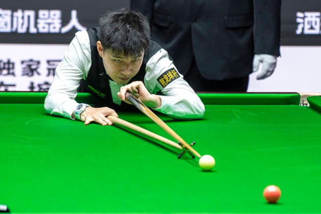 (260812) -- TAIYUAN, Aug. 12, 2026 -- Zhao Xintong of China competes during the round 1 match between Zhao Xintong of China and Zhang Anda of China at China Open 2026 snooker tournament in Taiyuan, north China s Shanxi Province, Aug. 11, 2026. ) (SP)CHINA-TAIYUAN-SNOOKER-CHINA OPEN-ROUND 1 (CN) CaoxYang