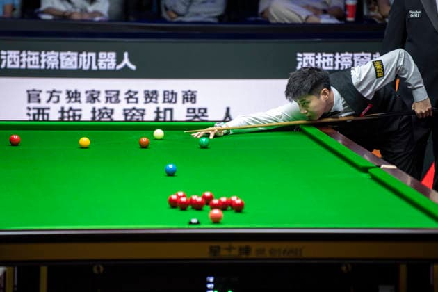 (260812) -- TAIYUAN, Aug. 12, 2026 -- Zhao Xintong of China competes during the round 1 match between Zhao Xintong of China and Zhang Anda of China at China Open 2026 snooker tournament in Taiyuan, north China s Shanxi Province, Aug. 11, 2026. ) (SP)CHINA-TAIYUAN-SNOOKER-CHINA OPEN-ROUND 1 (CN) CaoxYang