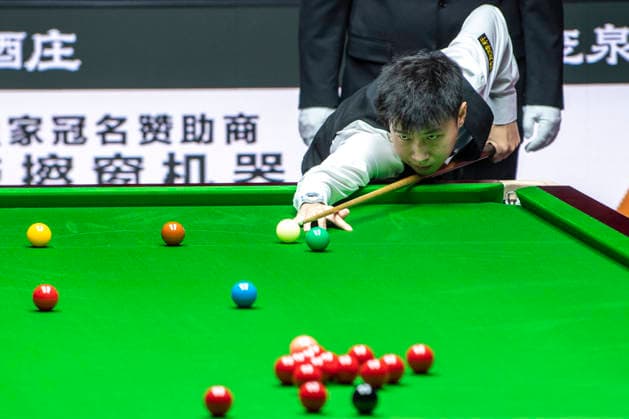 (260812) -- TAIYUAN, Aug. 12, 2026 -- Zhao Xintong of China competes during the round 1 match between Zhao Xintong of China and Zhang Anda of China at China Open 2026 snooker tournament in Taiyuan, north China s Shanxi Province, Aug. 11, 2026. ) (SP)CHINA-TAIYUAN-SNOOKER-CHINA OPEN-ROUND 1 (CN) CaoxYang