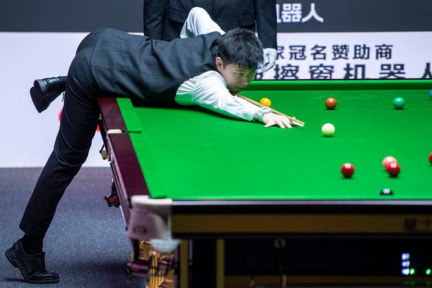(260812) -- TAIYUAN, Aug. 12, 2026 -- Zhao Xintong of China competes during the round 1 match between Zhao Xintong of China and Zhang Anda of China at China Open 2026 snooker tournament in Taiyuan, north China s Shanxi Province, Aug. 11, 2026. ) (SP)CHINA-TAIYUAN-SNOOKER-CHINA OPEN-ROUND 1 (CN) CaoxYang
