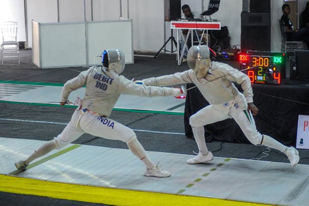 LAGOS, NIGERIA - AUGUST 11: Akinyosoye Oluwafolayemi, Nigeria and Bright Hentry Bebit, India during the 2026 Commonwealth Fencing Federation Championships - Senior Men s saber between Nigeria and India at Rugby School Eko Atlantic on August 11, 2026 in Lagos, Nigeria. Photo by Segun Ogunfeyitimi Copyright: xshengolpixsx