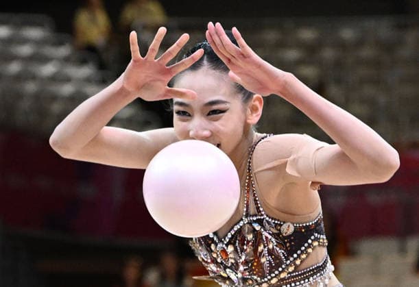 12.08.2026, xhbx, Rhythmische Sportgymnastik Weltmeisterschaft 2026, v.l. Qi Wang (China) (DFL DFB REGULATIONS PROHIBIT ANY USE OF PHOTOGRAPHS as IMAGE SEQUENCES and or QUASI-VIDEO) Frankfurt am Main
