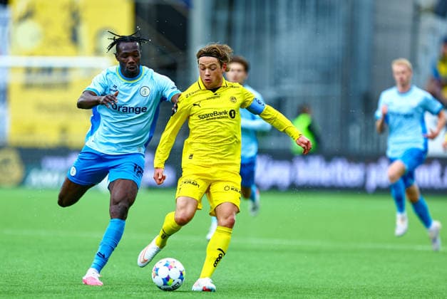 Soccer, Champions League 2025–2026 Bodo Glimt vs. Union Saint-Gilloise Bodø, August 11, 2026: Promise David and Patrick Berg during the Champions League qualifying match between Bodo Glimt and Union Saint-Gilloise at Aspmyra Stadium. Photo by Mats Torbergsen, NTB, Bodo, Norway. EDITORIAL USE ONLY; RESTRICTED USE FOR BETTING COMPANIES  Copyright: xMatsxTorbergsenx xNTBx