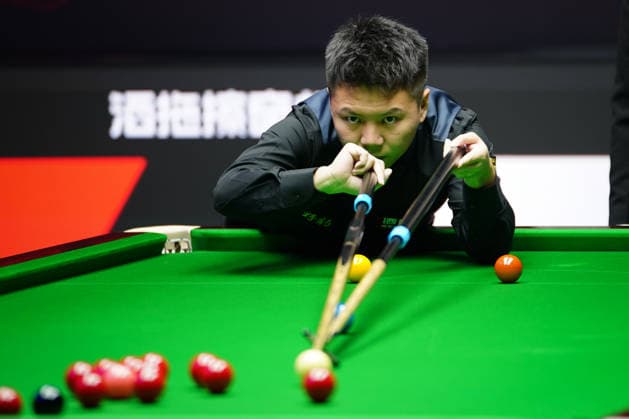 TAIYUAN, CHINA - AUGUST 12: Zhou Yuelong of China plays a shot in the second round match against Liu Hongyu of China on day 5 of the 2026 World Snooker Tour China Open at Taiyuan Binhe Sports Center on August 12, 2026 in Taiyuan, Shanxi Province of China.  Copyright: xTaixChengzhex 111659519967