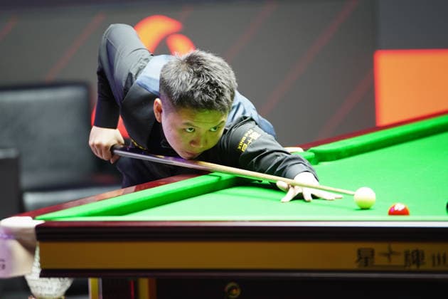 TAIYUAN, CHINA - AUGUST 12: Zhou Yuelong of China plays a shot in the second round match against Liu Hongyu of China on day 5 of the 2026 World Snooker Tour China Open at Taiyuan Binhe Sports Center on August 12, 2026 in Taiyuan, Shanxi Province of China.  Copyright: xTaixChengzhex 111659519973
