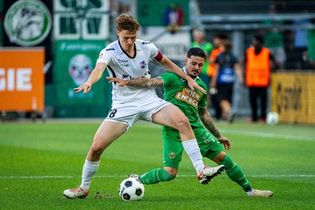 SOCCER - UEFA ECL, Rapid vs Paide VIENNA,AUSTRIA,12.AUG.26 - SOCCER - UEFA Conference League, qualification, SK Rapid Wien vs Paide Linnameeskond. Image shows Oskar Hoim (Paide) and Marco Tilio (Rapid).  GEPAxpictures xKevinxHackner