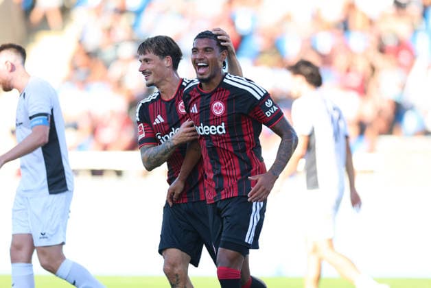 12.08.2026, Fussball Testspiel, FSV Frankfurt - Eintracht Frankfurt, v.l., Torjubel zum 0:1 durch Otavio Galdino Fernandes (Eintracht Frankfurt), Goal celebration, celebrate the goal, Robin Koch (Eintracht Frankfurt) DFL DFB REGULATIONS PROHIBIT ANY USE OF PHOTOGRAPHS AS IMAGE SEQUENCES AND OR QUASI-VIDEO. xdcx Copyright: HMBxMedia Claus