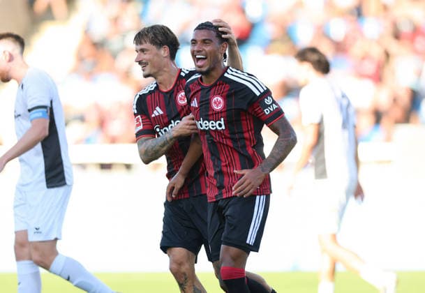 12.08.2026, Fussball Testspiel, FSV Frankfurt - Eintracht Frankfurt, v.l., Torjubel zum 0:1 durch Otavio Galdino Fernandes (Eintracht Frankfurt), Goal celebration, celebrate the goal, Robin Koch (Eintracht Frankfurt) DFL DFB REGULATIONS PROHIBIT ANY USE OF PHOTOGRAPHS AS IMAGE SEQUENCES AND OR QUASI-VIDEO. xdcx Copyright: HMBxMedia Claus
