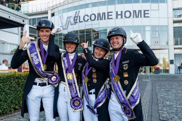 AACHEN - FEI World Championships 2026, AACHEN - FEI World Championships 2026 Team Germany HEMMER Katharina (GER), NETZ Raphael (GER), WANDRES Frederic (GER), WERTH Isabell (GER), ROESER Klaus (Chef dÂ Equipe) Medal ceremony Team FEI Dressage World Championship, WM, Weltmeisterschaft Grand Prix de Dressage Team Finale & Einzelqualifikation Lambertz-Preis Aachen, Reitstadion Soers 12. August 2026 -