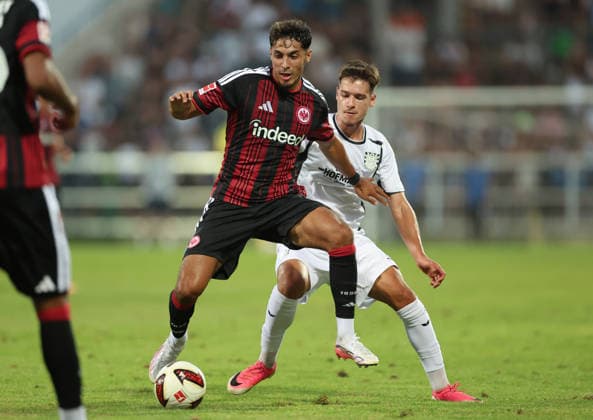 12.08.2026, Fussball Testspiel, FSV Frankfurt - Eintracht Frankfurt, v.l., Fares Chaibi (Eintracht Frankfurt), Leandro Simunic (FSV Frankfurt) DFL DFB REGULATIONS PROHIBIT ANY USE OF PHOTOGRAPHS AS IMAGE SEQUENCES AND OR QUASI-VIDEO. xdcx Copyright: HMBxMedia Claus