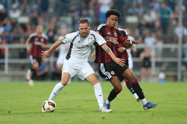 12.08.2026, Fussball Testspiel, FSV Frankfurt - Eintracht Frankfurt, v.l., Lukas Gottwalt (FSV Frankfurt), Malik Pimpong (Eintracht Frankfurt) DFL DFB REGULATIONS PROHIBIT ANY USE OF PHOTOGRAPHS AS IMAGE SEQUENCES AND OR QUASI-VIDEO. xdcx Copyright: HMBxMedia Claus