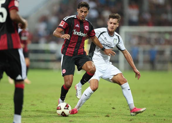 12.08.2026, Fussball Testspiel, FSV Frankfurt - Eintracht Frankfurt, v.l., Fares Chaibi (Eintracht Frankfurt), Leandro Simunic (FSV Frankfurt) DFL DFB REGULATIONS PROHIBIT ANY USE OF PHOTOGRAPHS AS IMAGE SEQUENCES AND OR QUASI-VIDEO. xdcx Copyright: HMBxMedia Claus