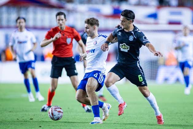 August 13, 2026, Split, Dalmatia, Croatia: Adrion Pajaziti (HNK HAJDUK SPLIT) 4 in action with the ball during the second leg of the UEFA Europa Conference League third qualifying round match between HNK Hajduk Split (CRO) and FK Zalgiris (LTU) at Poljud Stadium. On photo Adrion Pajaziti (HNK HAJDUK SPLIT) 4 and Marko Capan (FK Zalgiris) 6. Split Croatia - ZUMAp210 20260813_zsp_p210_015 Copyright: xMajaxPrgometx