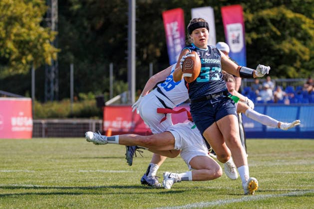 Germany (GER) vs. Slovenia (SLO), Day 2 Women at IFAF Flag Football Championships Düsseldorf 2026, 14.08.2026 Duesseldorf, Germany - Aug. 14, 2026: Kaja Koncilija (SLO 77) and Lina Kristin Adrian (GER 33) during the match between Germany (GER) vs. Slovenia (SLO) on the second day of the Women IFAF Flag Football World Championships at the Bezirkssportanlage Duesseldorf Garath Copyright: xBEAUTIFULxSPORTS B.Hoffmannx
