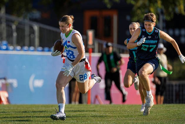 Germany (GER) vs. Slovenia (SLO), Day 2 Women at IFAF Flag Football Championships Düsseldorf 2026, 14.08.2026 Duesseldorf, Germany - Aug. 14, 2026: Tia GovejÅ¡ek (SLO 28) and Dora Jasmin Jung (GER 27) during the match between Germany (GER) vs. Slovenia (SLO) on the second day of the Women IFAF Flag Football World Championships at the Bezirkssportanlage Duesseldorf Garath Copyright: xBEAUTIFULxSPORTS B.Hoffmannx