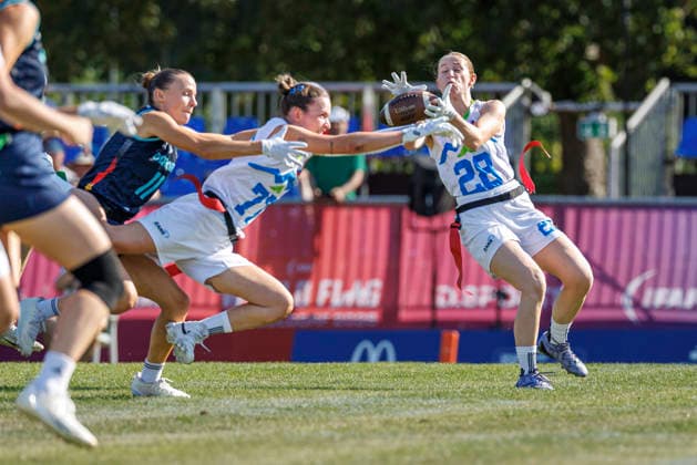 Germany (GER) vs. Slovenia (SLO), Day 2 Women at IFAF Flag Football Championships Düsseldorf 2026, 14.08.2026 Duesseldorf, Germany - Aug. 14, 2026: Hannah Charlotte Bahn (GER 11), Kaja Koncilija (SLO 77) and Tia GovejÅ¡ek (SLO 28) during the match between Germany (GER) vs. Slovenia (SLO) on the second day of the Women IFAF Flag Football World Championships at the Bezirkssportanlage Duesseldorf Garath Copyright: xBEAUTIFULxSPORTS B.Hoffmannx