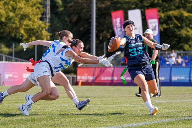 Germany (GER) vs. Slovenia (SLO), Day 2 Women at IFAF Flag Football Championships Düsseldorf 2026, 14.08.2026 Duesseldorf, Germany - Aug. 14, 2026: Kaja Koncilija (SLO 77) and Lina Kristin Adrian (GER 33) during the match between Germany (GER) vs. Slovenia (SLO) on the second day of the Women IFAF Flag Football World Championships at the Bezirkssportanlage Duesseldorf Garath Copyright: xBEAUTIFULxSPORTS B.Hoffmannx