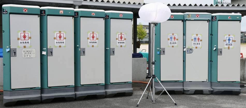 Aftermath of strong earthquake in Kumamoto Photo taken on Aug. 9, 2026, shows temporary toilets set up at junior high school used as an evacuation center in Yatsushiro in the southwestern Japan prefecture of Kumamoto, following a powerful earthquake that struck the region on July 28.  A14AA0005625804P
