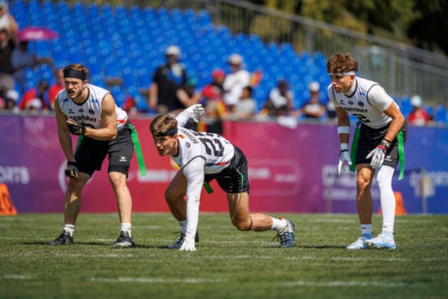 Germany (GER) vs. Brazil (BRA), Day 2 Men at IFAF Flag Football Championships Düsseldorf 2026, 14.08.2026 Duesseldorf, Germany - Aug. 14, 2026: Fabian Achenbach (GER 21), Ramon Emanuel Seifert (GER 25) and Moritz Kulenovic (GER 2) during the match between Germany (GER) vs. Brazil (BRA) on the second day of the Men IFAF Flag Football World Championships at the Bezirkssportanlage Duesseldorf Garath Copyright: xBEAUTIFULxSPORTS B.Hoffmannx
