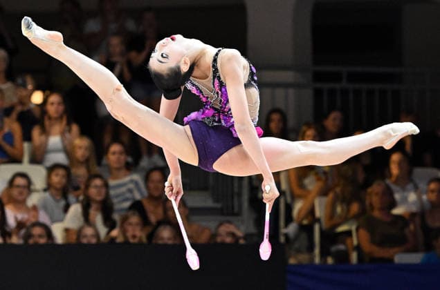 14.08.2026, xhbx, Rhythmische Sportgymnastik Weltmeisterschaft 2026, v.l. Qi Wang (China) Keulen (DFL DFB REGULATIONS PROHIBIT ANY USE OF PHOTOGRAPHS as IMAGE SEQUENCES and or QUASI-VIDEO) Frankfurt am Main