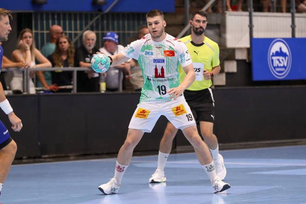 14.08.2026, xgox, Handball - Wartburg Cup TBV Lemgo-Lippe - SC Magdeburg emspor, v.l. Elvar Oern Jonsson (Magdeburg, 19) am Ball, plays the ball Eisenach