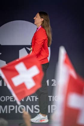 RECORD DATE NOT STATED 14th August 2026; Alexander Stadium, Birmingham, Midlands, England; 2026 European Athletics Championships, Day Five; Angelica Moser (SUI) on the podium after winning the womens pole vault as Switzerland fans wave their flags GodfreyxPitt