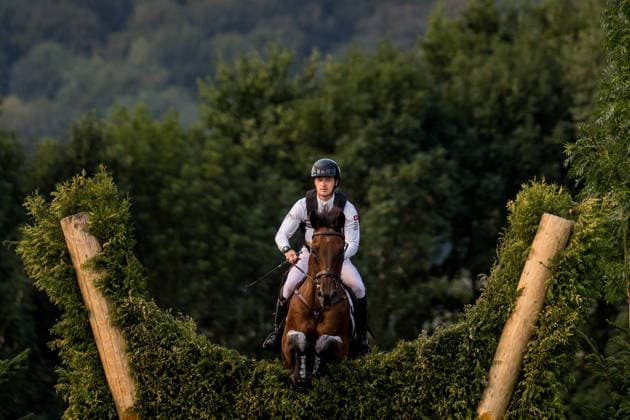 260815 Robin Godel of Switzerland with horse Grandeur de Lully compete in the Eventing Cross-Country during day 5 of the 2026 FEI World Championships on August 15, 2026 in Aachen. Photo: Emma Wallskog BILDBYRAN kod EW EW0685 ridsport equestrian rid-vm 2026 2026 fei world championships bbeng ridsport-vm fälttävlan eventing terrängritt terräng Copyright: EMMAxWALLSKOG BB260815EW009