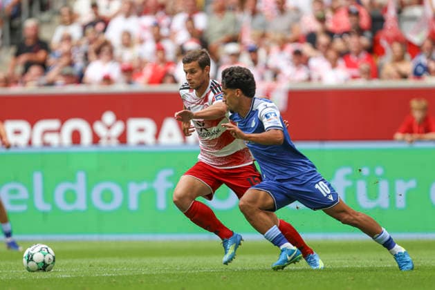 Tim Oberdorf (Fortuna Duesseldorf) und Yasin Batuhan Muhammed Zor (TSG Hoffenheim II) im Zweikampf waehrend des Spiels der 3. Liga zwischen Fortuna Duesseldorf und TSG 1899 Hoffenheim II, Merkur Spiel-Arena am 15. August 2026 in Duesseldorf, Deutschland. (Foto von Oliver Kaelke DeFodi Images) +++ Tim Oberdorf (Fortuna Duesseldorf) und Yasin Batuhan Muhammed Zor (TSG Hoffenheim II) battle for the ball during the 3. Liga match between Fortuna Duesseldorf and TSG 1899 Hoffenheim II at Merkur Spiel-Arena on August 15, 2026 in Dusseldorf, Germany. (Photo by Oliver Kaelke DeFodi Images) DFB DFL REGULATIONS PROHIBIT ANY USE OF PHOTOGRAPHS AS IMAGE SEQUENCES AND OR QUASI-VIDEO. (Photo by Oliver Kaelke DeFodi Images) -